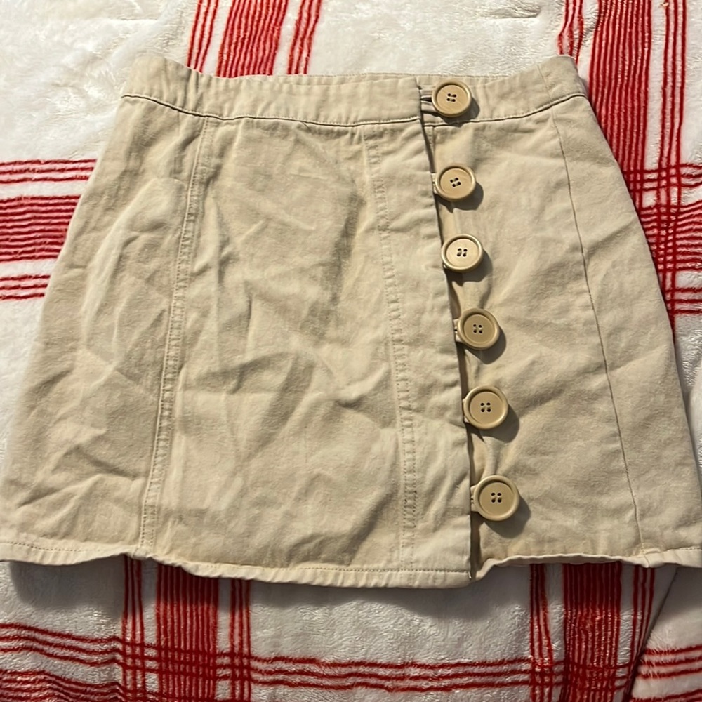 Small tan mini skirt
